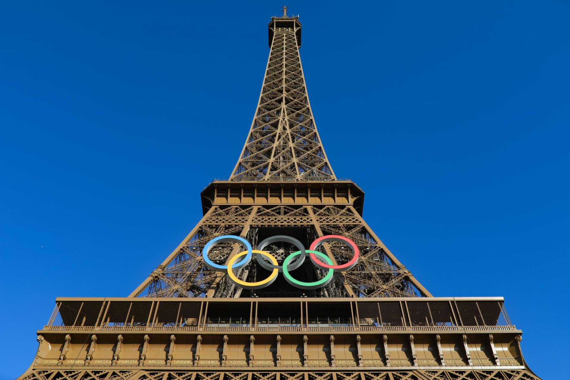 The Eiffel Tower harbors the OLYMPIC RINGS for the Paris 2024 Olympic Games.